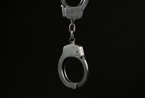 arrest handcuffs criminal offense conviction