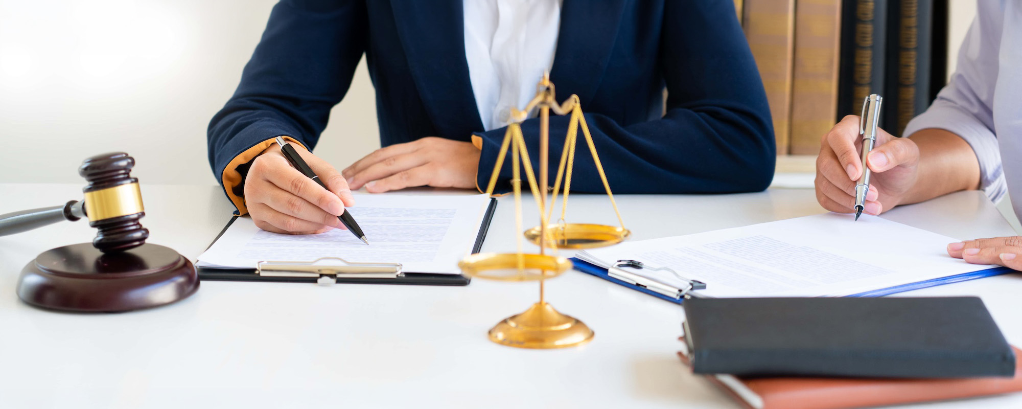 Women lawyer discussing with clients in courtroom. justice and law attorney court judge meeting concept
